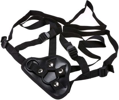 Adjustable black strap-on harness for silicone sex toy, featuring secure buckles and durable material.